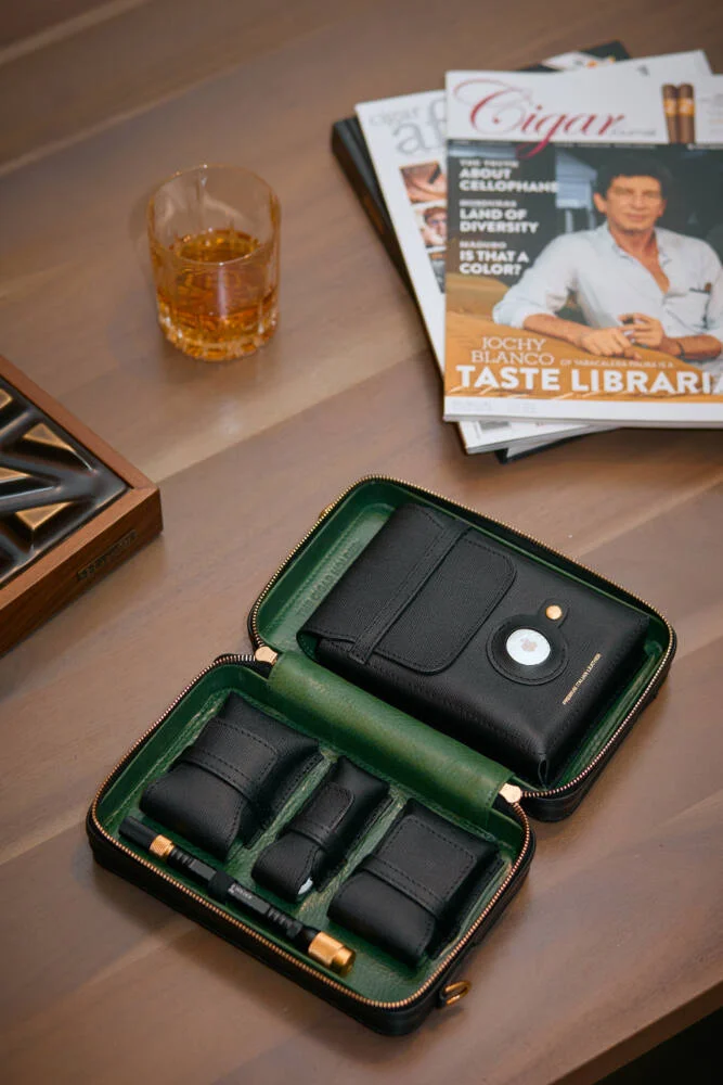 Knightsbridge Edition cigar case with classic black leather and vibrant green interior