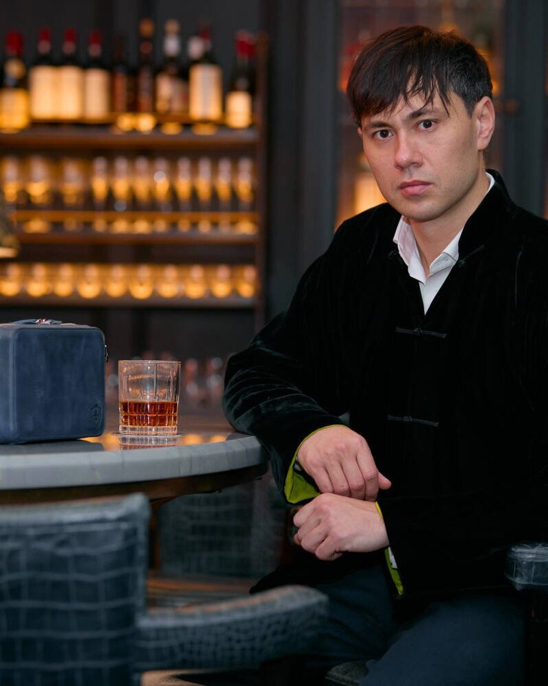 Aficionado Elegance - Sleek Italian leather crossbody bag featured in a stylish, professional setting