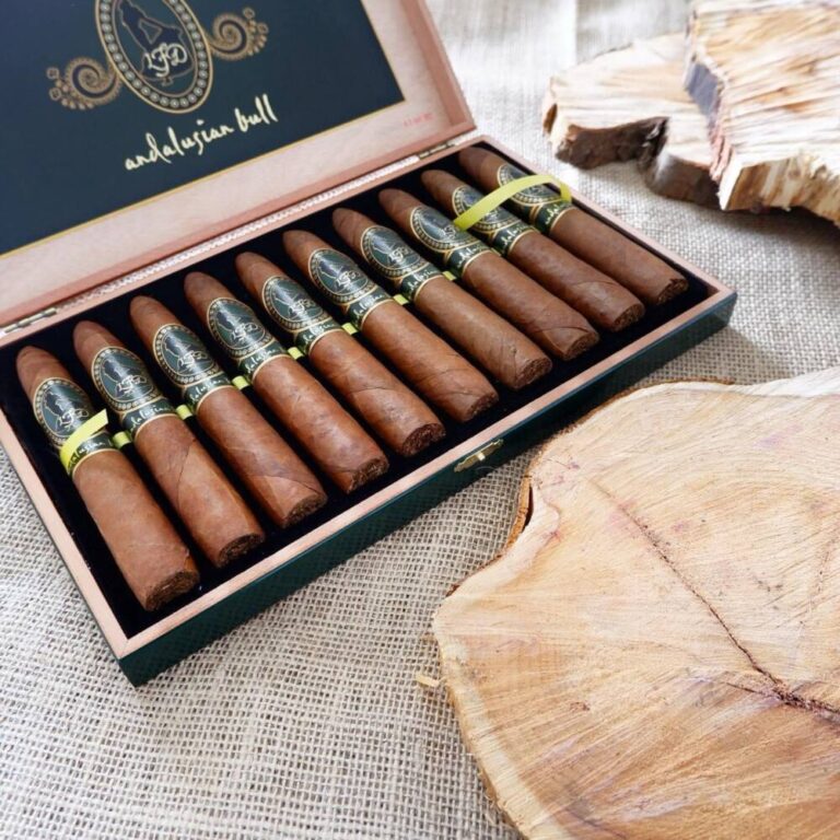 Premium La Flor Dominicana Andalusian Bull cigars in an elegant box against a rustic wooden and burlap background, showcasing top-tier cigar craftsmanship.